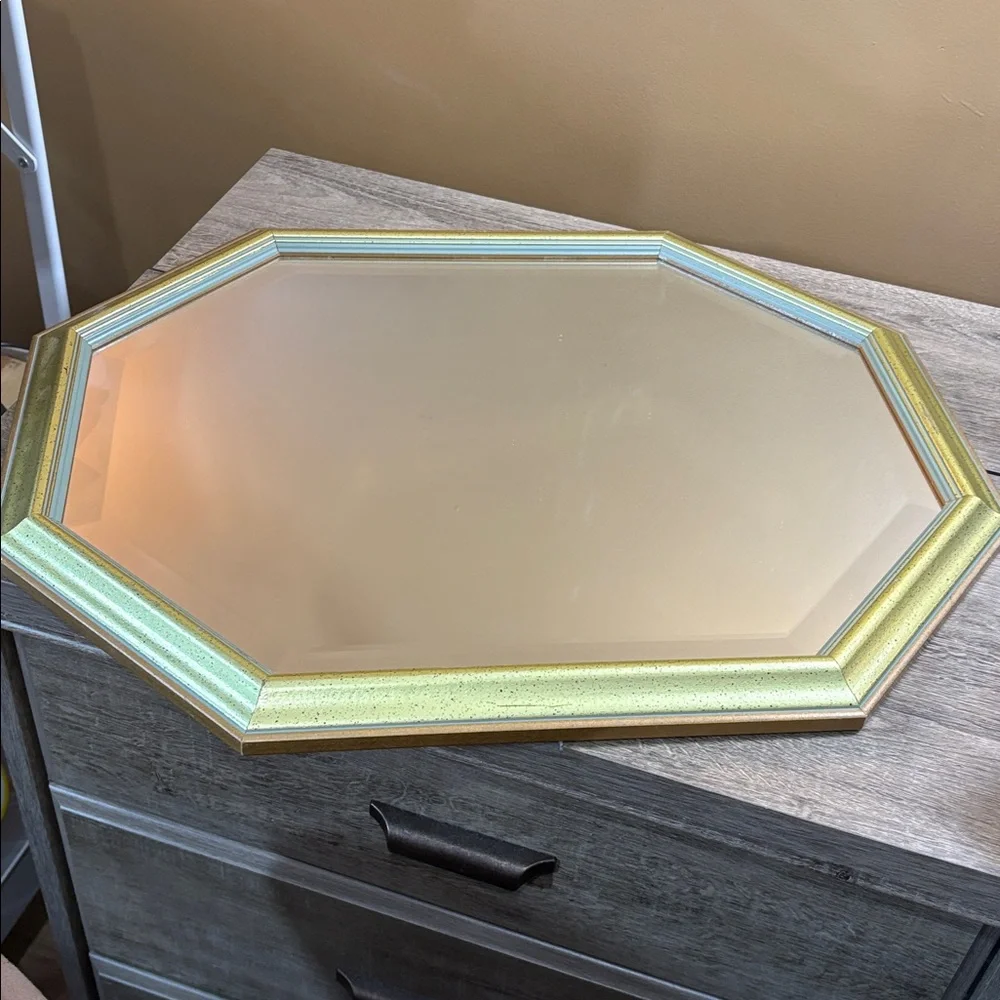 A mid century modern style octagonal mirror vertical or horizontal orientation
